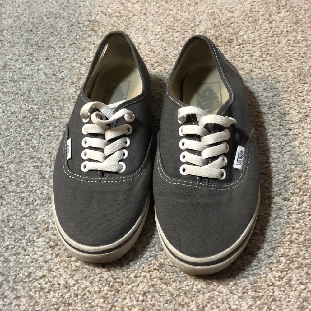 Woman’s grey vans